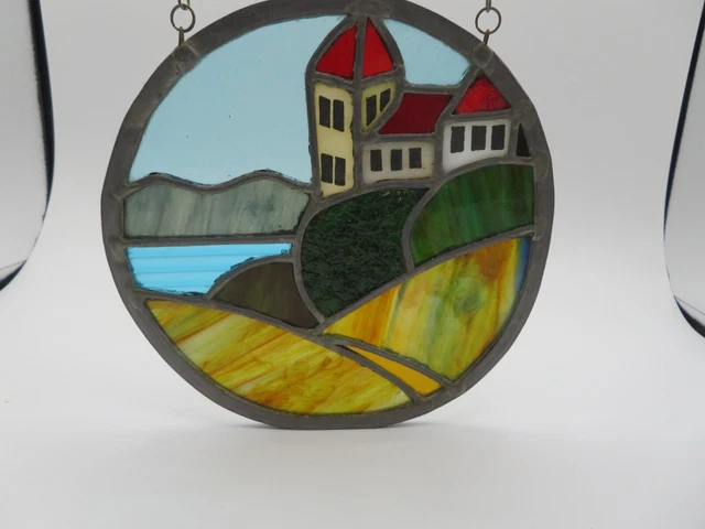 Hanging Leaded Stained Glass Panel With White/Red Roof Bldg Landscape 7" dia.