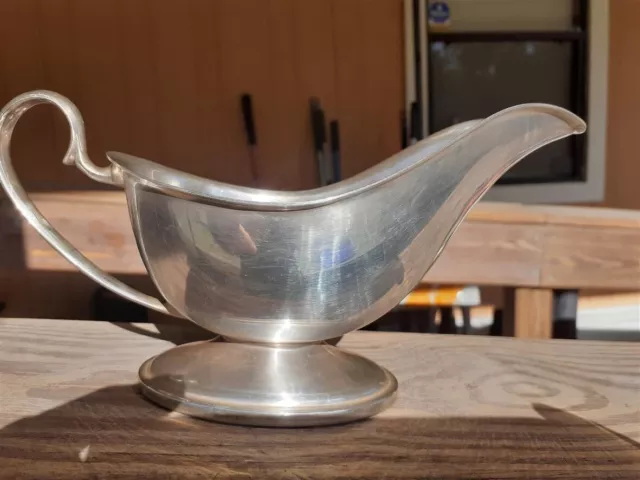 Solid vintage silver gravy boat