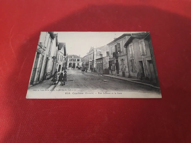 cpa Coutras rue Lalanne et la gare