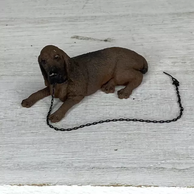 Bloodhound Figurine Relaxing Lounging Dog with Chain 3”