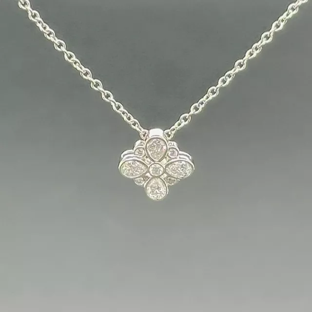 Estate Tiffany & Co Platinum Enchant Flower 0.14cttw G-H/VS2 Diamond Pendant