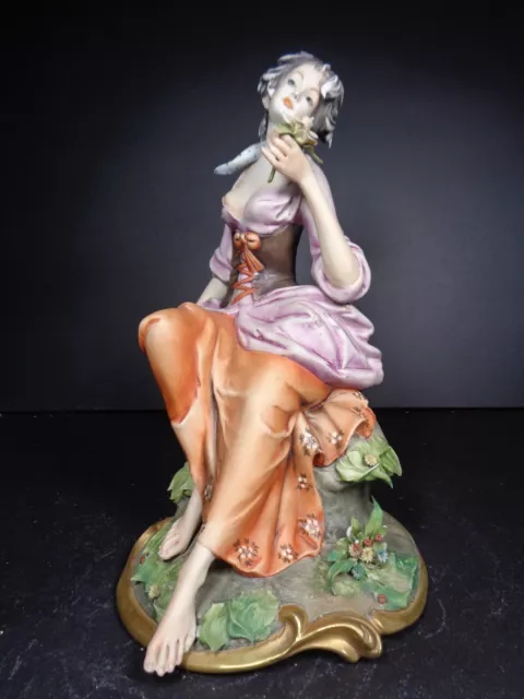 Capodimonte Bruno Merli - Seated Busty Lady With Flowers