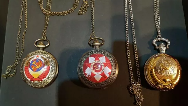 Relojes de bolsillo escudo ruso con pila de repuesto.Conjunto de Tres unidades.