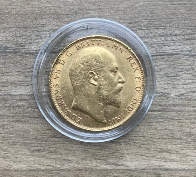 1910 Edward VII Full Gold Sovereign in capsule.