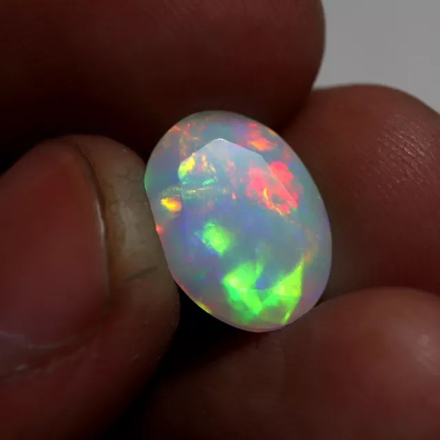 3.6 Carat 13.1x9.9x7.1 MM Natural AAAA Flashy Fire Oval Cut White Ethiopian Opal