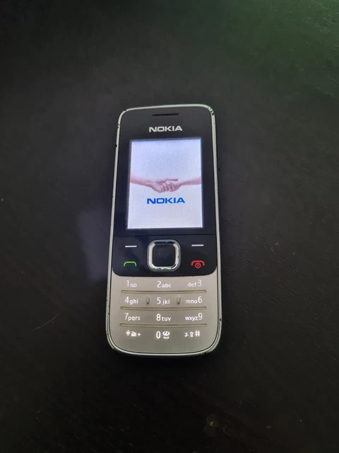 NOKIA 2730c-1 con alimentatore originale, auricolari e scheda micro SD da 1 GB