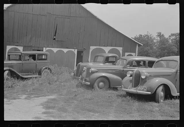 Autos of spectators attending farmland auction,New Carlisle,Ohio,OH,1938,FSA,1