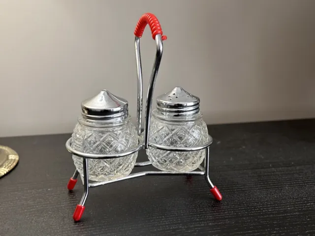 Vintage c1950s/1960s Salt And Pepper Shakers With Atomic Silver And Red Caddy