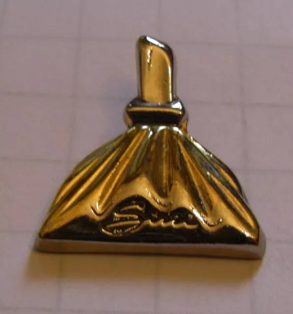 Pin's PARFUM SISSI MARC DE LA MORANDIERE PERFUME