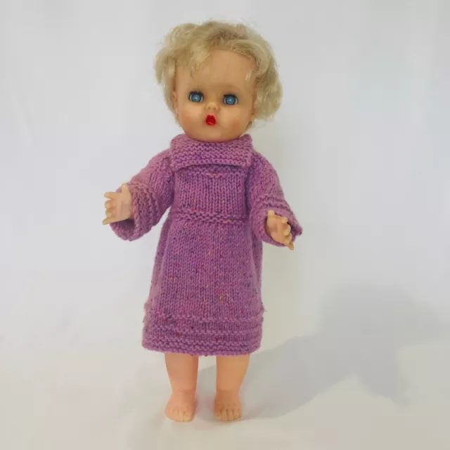 Vintage Vinyl Doll With Blue Blinking eyes And Blonde Hair standing