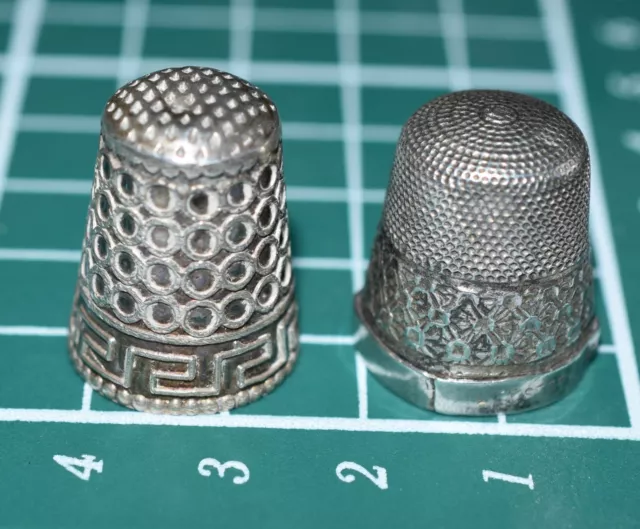 Two antique silver thimbles, one sized 15  and one other