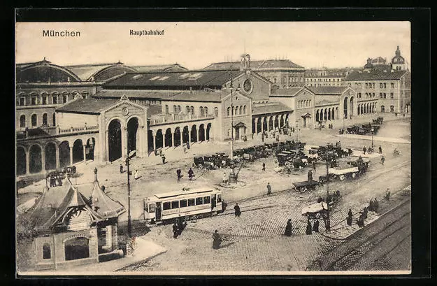 AK München, Hauptbahnhof mit Droschken und Strassenbahn aus der Vogelschau 1915