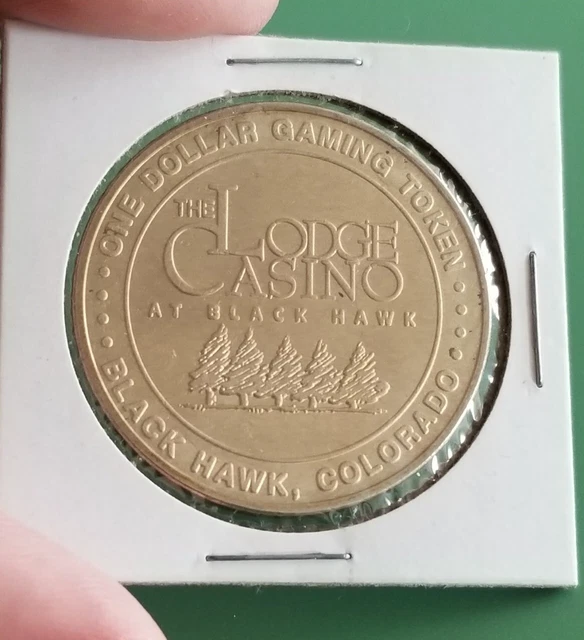 OBSOLETE! Vintage THE LODGE CASINO CASINO (Black Hawk) BRASS $1 GAMING TOKEN OBSOLETE! Vintage THE LODGE CASINO CASINO (Black Hawk) BRASS $1 GAMING TOKEN