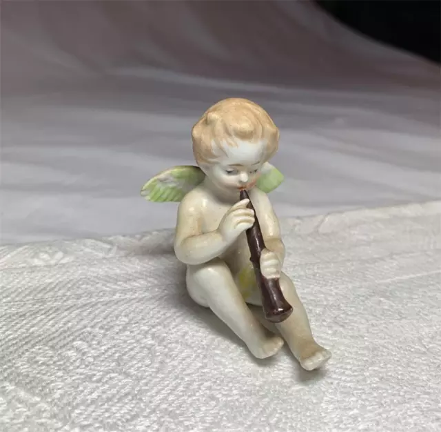 ANTIQUE CHERUB ANGEL CLARINET HORN MUSICIAN Kister Scheib 19thC GERMAN PORCELAIN