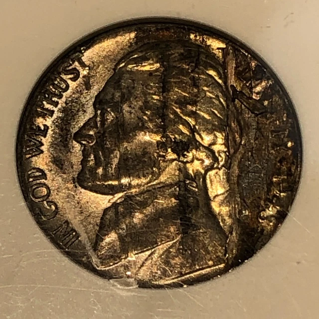 1943-P Jefferson war nickel obverse LAMINATION ERROR. Early ANACS AU scratched.