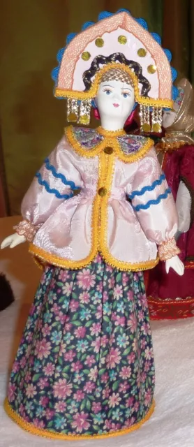 Handmade souvenir collection, porcelain art, textiles doll festive Russian folk