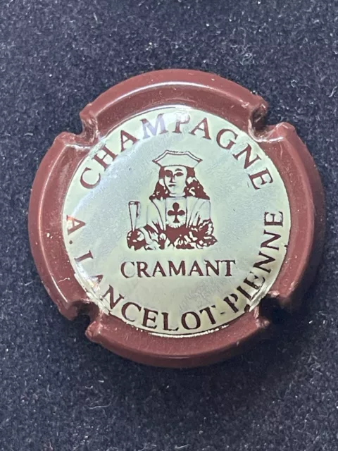 capsule de champagne "a.lancelot pienne n°14 marron gris " côte de 1,5 euros