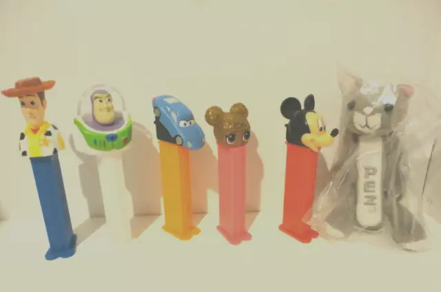 6 Pez Dispensers Buzz,Woody,Mickey Mouse,Cars,McQueen,Lol Doll,Cats&Dogs Plush