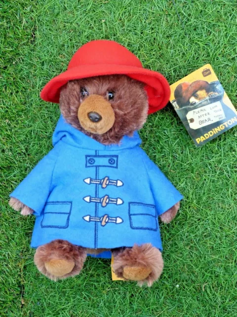 Peluche ours Paddington Bear manteau bleu chapeau rouge 24 cm - SOS