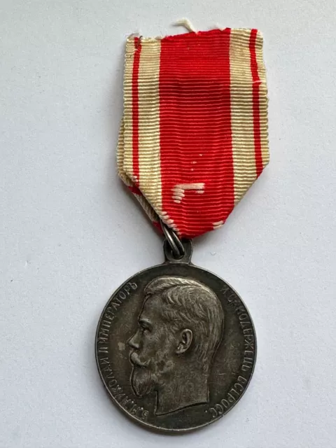 Médaille bravoure  du zèle avec son ruban soie d'origine Russie Tsar Nicolas 2