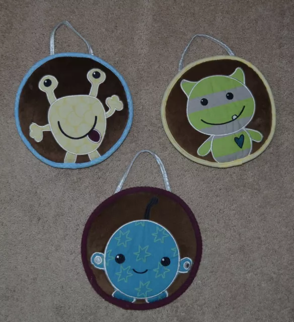 Set of Three CoCaLo Baby Peek-a-Boo Monsters Round Plush Wall Art Decor