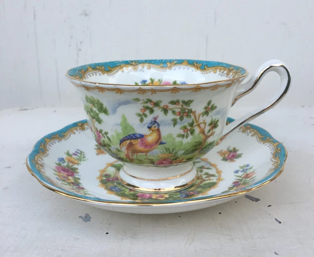 Taza de té y platillo Royal Albert pájaro hueso dorado china té del Reino Unido BX19