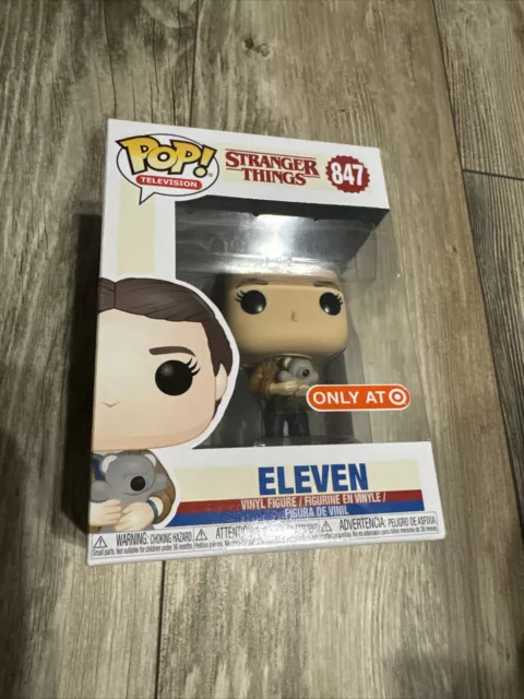 Eleven with teddy bear funko pop top