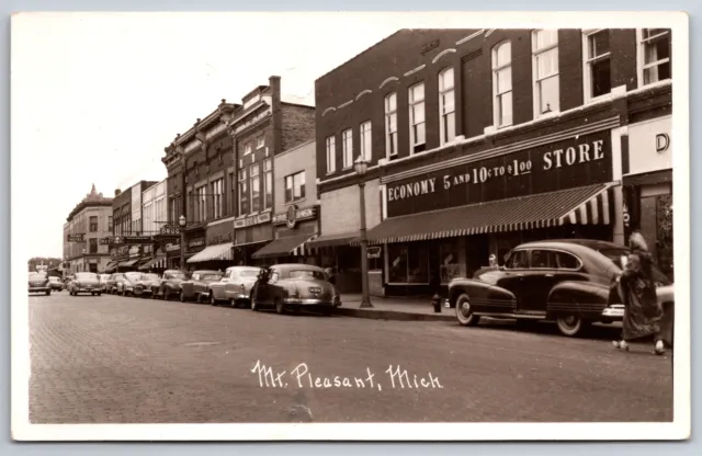 Mt Pleasant Michigan~Main Street~Economy 5&10c Store~Saddle Shoes Girl~1950 RPPC