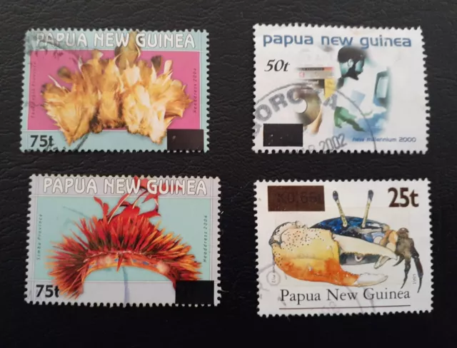 4 x Surcharge overprints, fine used Papua New Guinea Stamps