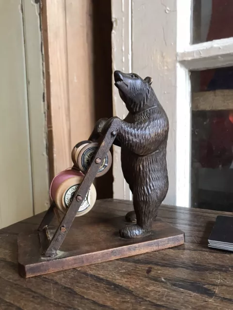 Antique Black Forest Carved  Bear Holding A Ladder of Sewing Bobbin Reels Holder