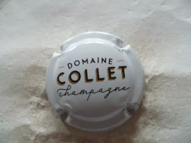 A Saisir  Capsule De Champagne.  Collet.   Nr.   Blanc.