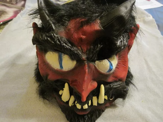 Unworn PMG Halloween Latex Mask with black hair "Lecherous Legion"