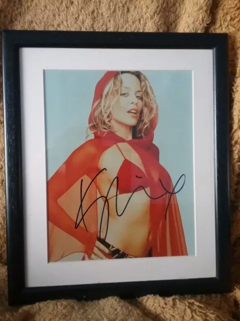 Kylie Minogue signed autograph from 2002 signed at The Mercer Hotel in New York