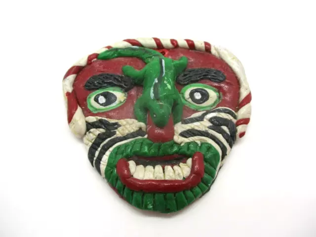 Odd little Pottery Mask with Lizard on the Nose
