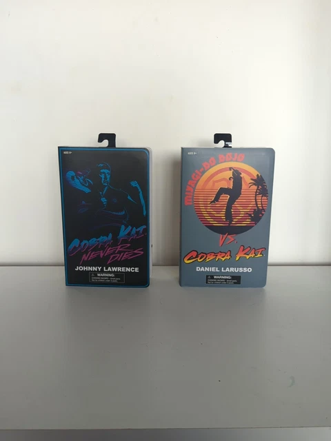 Diamond Select - SDCC 2022 Cobra Kai Johnny VHS Action Figure2022 Diamond Select - Cobra Kai - JOHNNY LAWRENCE VHS SDCC...Cobra Kai