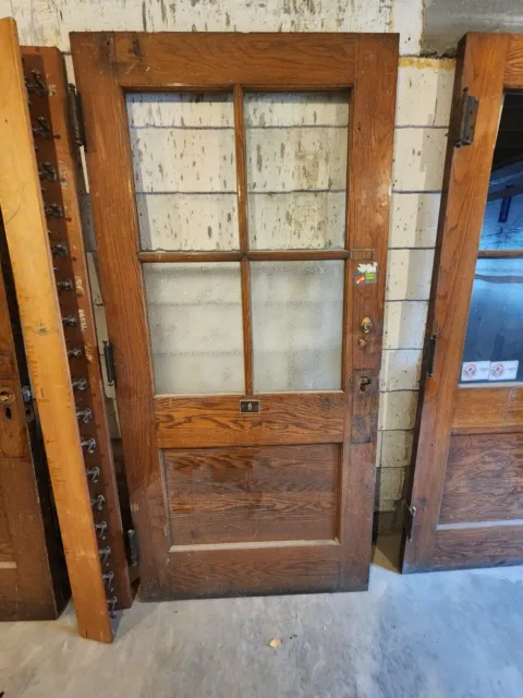 antique hardwood oak doors artistic glass circa 1940. Very heavy very solid 3