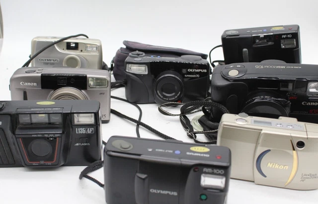 C x8 Vintage Point & Shoot Cameras Inc. Olympus AM100, Canon Sure Shot, Nikon