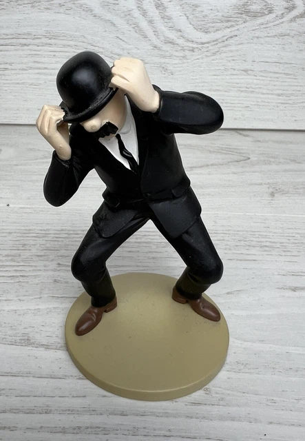 Figurine Rare Tintin : Dupond Engoncé Dans Son Chapeau, Sur Socle Gris. Moulinsart, état Parfait Dans Sa Boîte.