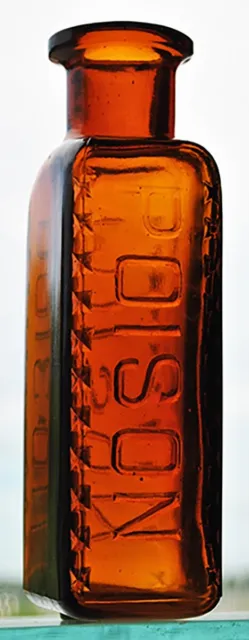 Embossed Poison, amber color, 5 3/4” high, “POISON”