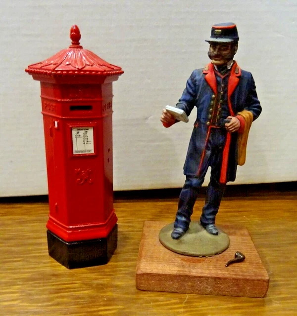 A DIECAST MODEL of a 19th Century Postman mounted on a Wooden Base ...