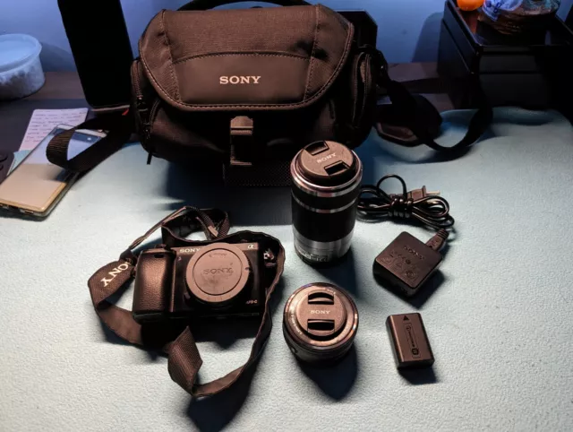 Sony A6000: body, kit lens-16-50mm, 50-210mm lens, 2 batteries and Sony bag