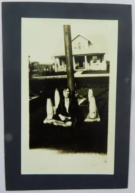 Young Woman in Night Robe Outside of Home Sitting in Grass - Photograph