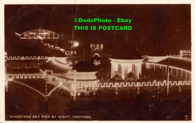 R412059 Bandstand and Pier by Night. Hastings. 3. RP. 1927