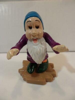 sleepy dwarf figurine