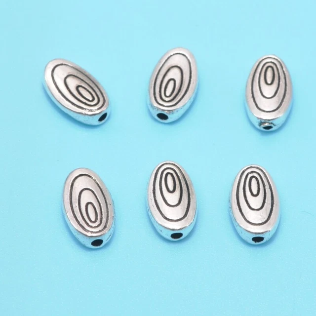 40 piezas espaciador de cuentas sueltas ovalado plata tibetana 10 mm