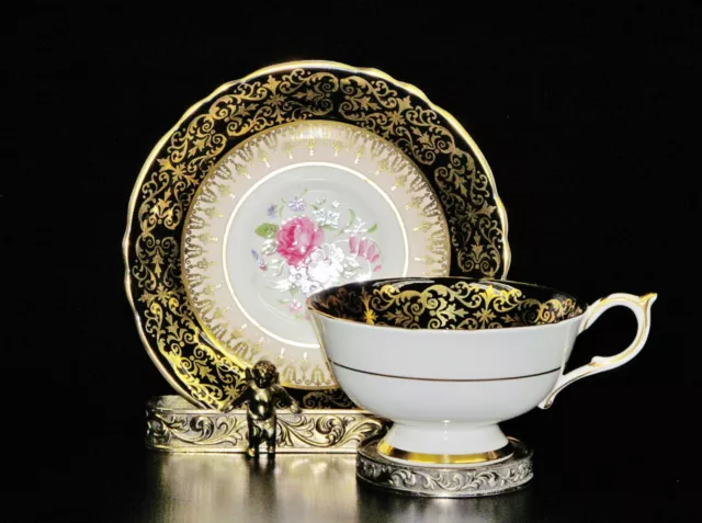 A beautiful Hand Painted cabinet cup & saucer by Paragon china. Dating to c 1900