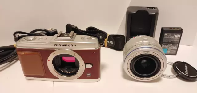 [READ] Olympus Pen E-P2 12.3MP Digital Camer w/ M.Zuiko Digital 14-42mm Lens