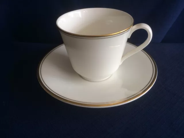 Royal Doulton Gold Concord tea cup & saucer (very minor rim gilt wear on cup)