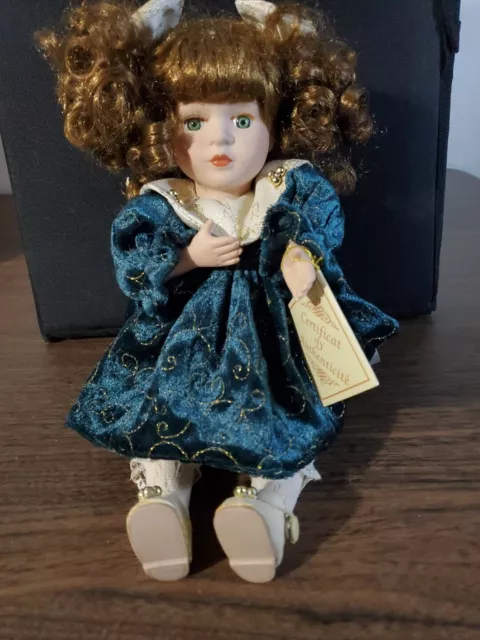 Collectors Choice Porcelain Doll Sitting Wind Up With Movement,Music And COA