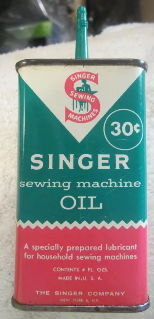 VINTAGE SINGER SEWING MACHINE OIL 4 OZ TIN WITH 75 CENT PRICE SOME